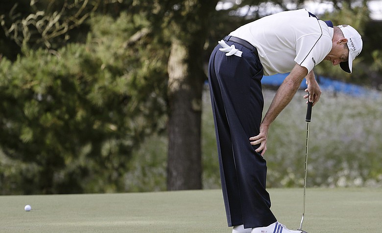 Jim Furyk reacts to a missed birdie putt at Olympic Club's 16th.