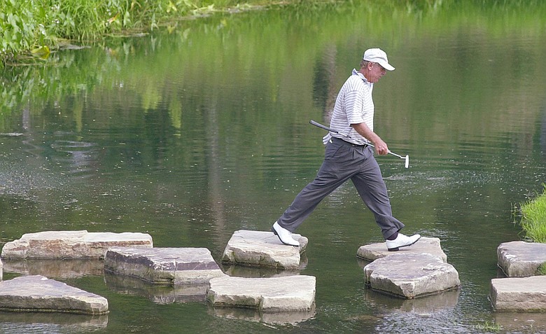 Graham Marsh makes his way to the 17th green during the first round of the 2002 Champions Tour's Allianz Championship at Glen Oaks Country Club in West Des Moines, Iowa.