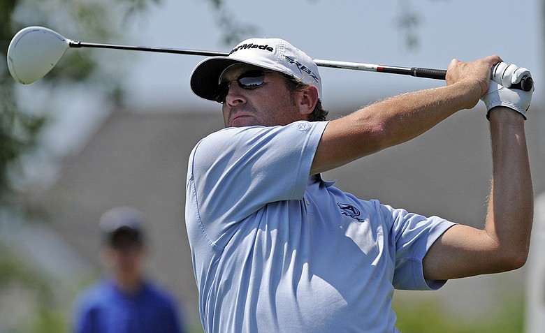 David Mathis watches his drive on the first hole during the first round of the Travelers Championship golf tournament in Cromwell, Conn., Thursday, June 21, 2012.