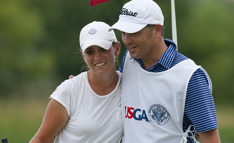 Ashlan Ramsey hugs her caddie after winning her match on the 18th hole as seen during the semifinal round of match play at the 2012 U.S. Women's Public Links at Neshanic Valley Golf Course.