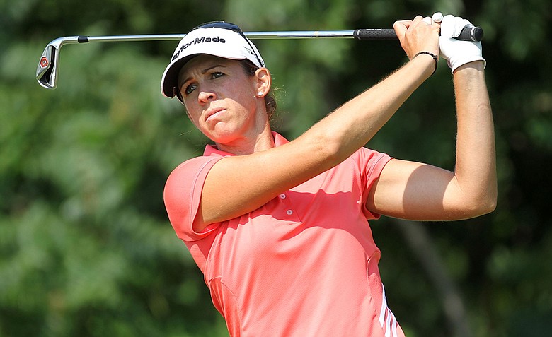 Nicole Castrale hits her tee shot on the par-4 14th hole during the third round of the 2012 U.S. Women's Open.