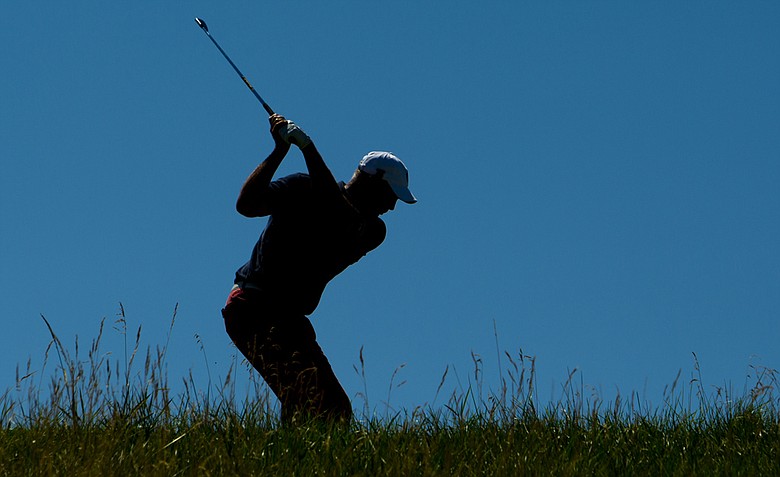 Tom Lehman plays his tee shot on the 13th hole during a practice round at the 2012 U.S. Senior Open at Indianwood Golf & Country Club in Lake Orion, Mich. on Tuesday, July 10, 2012.