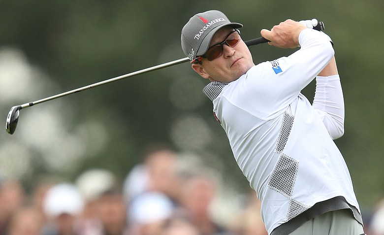 Zach Johnson hits a tee shot on the 14th hole during the first round of the 141st Open Championship at Royal Lytham & St. Annes Golf Club.
