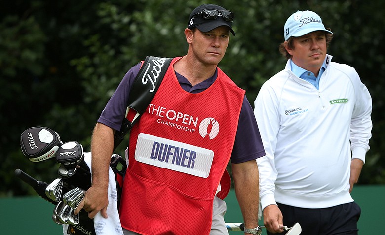 Jason Dufner walks with his caddie Gary Matthews during the third round of the 141st Open Championship at Royal Lytham & St. Annes Golf Club.