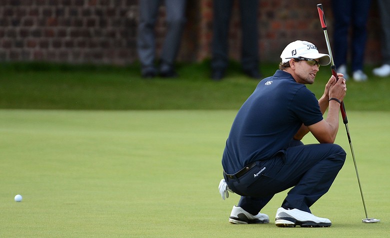 Adam Scott reacts to a missed par putt on the 18th green during the final round of the 141st Open Championship at Royal Lytham & St. Annes Golf Club.