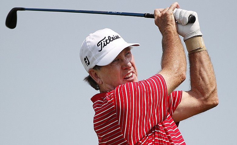 Gil Morgan tees off on the seventh hole during the first round of the Champions Tour golf on Friday August 3, 2012 in Blaine, Minn.