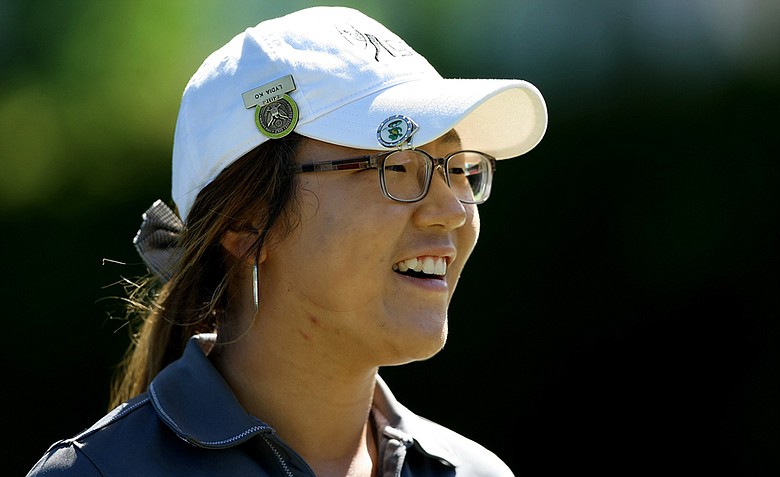 Lydia Ko of New Zealand leads after the first round of stroke play at the 2012 U. S. Women's Amateur Championship at The Country Club. She posted a 66.
