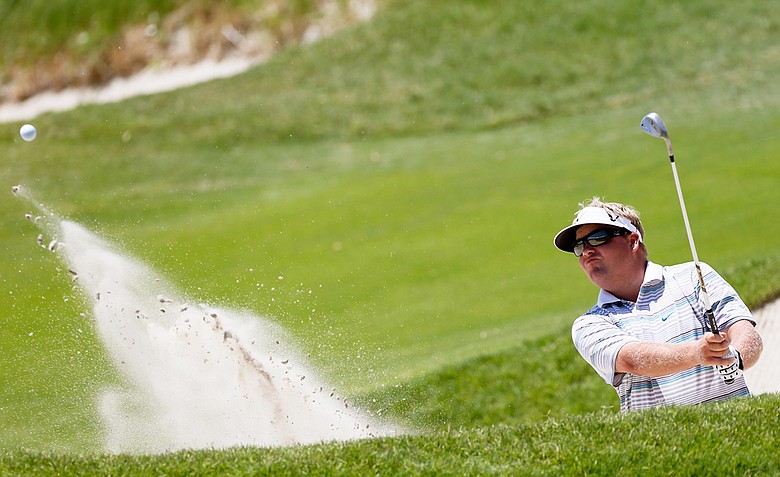 Carl Pettersson hits out of a bunker on the 17th hole during Round One of the 94th PGA Championship at the Ocean Course on August 9, 2012 in Kiawah Island, S.C.