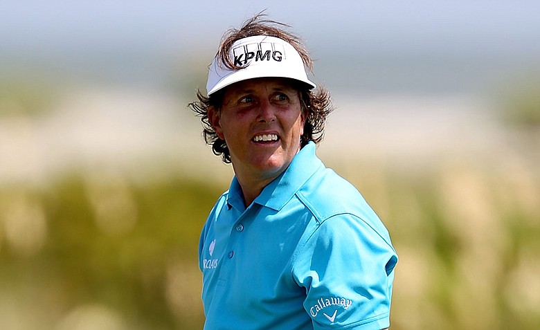 Phil Mickelson looks on after his shot on the sixth tee during Round One of the 94th PGA Championship at the Ocean Course on August 9, 2012 in Kiawah Island, S.C.