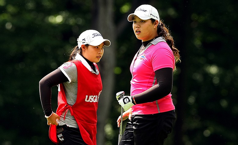 Moriya Jutanugarn, left, and her sister, Ariya, during the quarterfinals at the 112th U. S. Women's Amateur Championship. Ariya defeated Erynne Lee to advance to the semifinals.