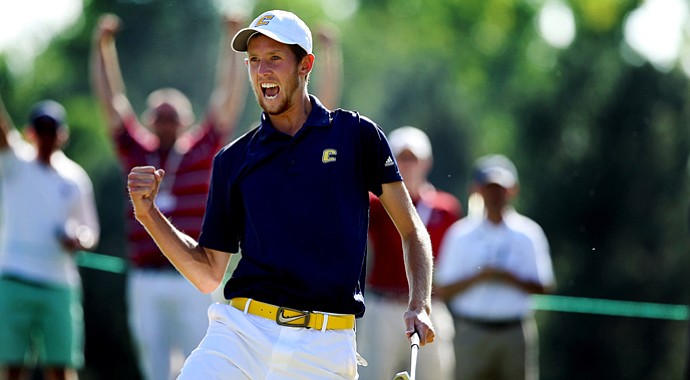 Steven Fox yells as he sinks his putt at the 37th hole to win the 112th U. S. Amateur Championship at Cherry Hills Country Club in Cherry Hills Village, Colo. He defeated Michael Weaver on the 37th hole.