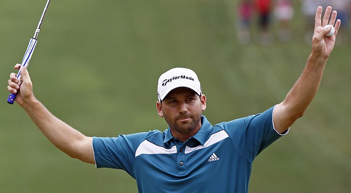 Sergio Garcia reacts on the 18th green after winning the rain delayed 2012 Wyndham Championship.