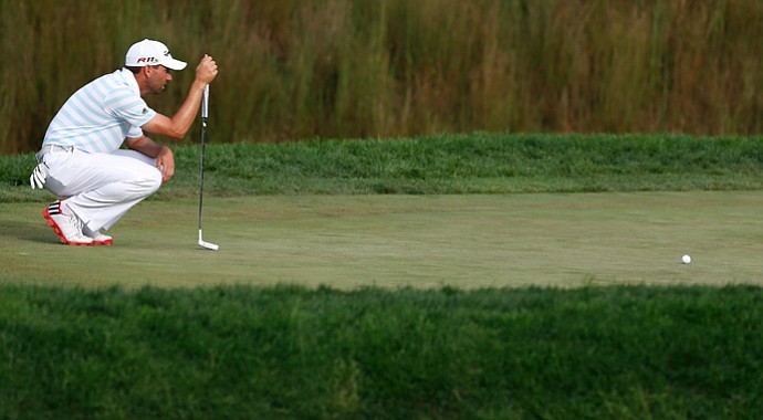 Sergio Garcia lines up a putt on the 16th green during the third round of The Barclays at the Black Course at Bethpage State Park.