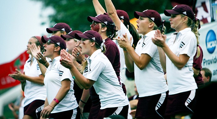 Texas A&M players cheer during the third round of the 2011 NCAA Championship.