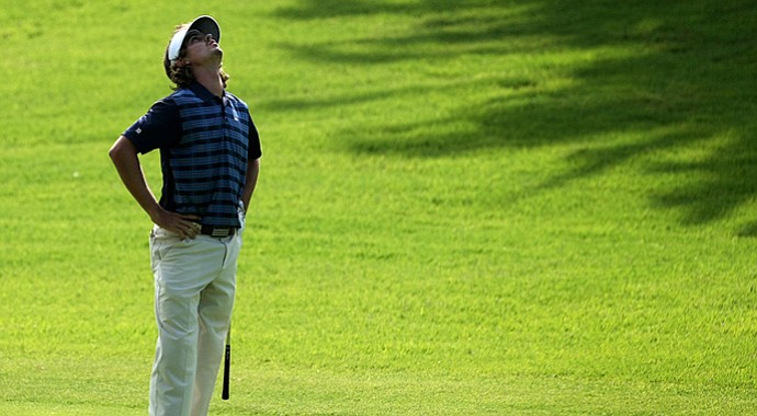UCLA's Pedro Figueiredo reacts to his second shot at No. 18 during the first day of Match Play. Figueiredo lost to Oregon's Daniel Miernicki.