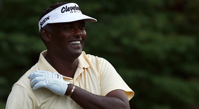 Vijay Singh fired a 6-under 66 on Friday to take a one-shot lead into the weekend at the BMW Championship.