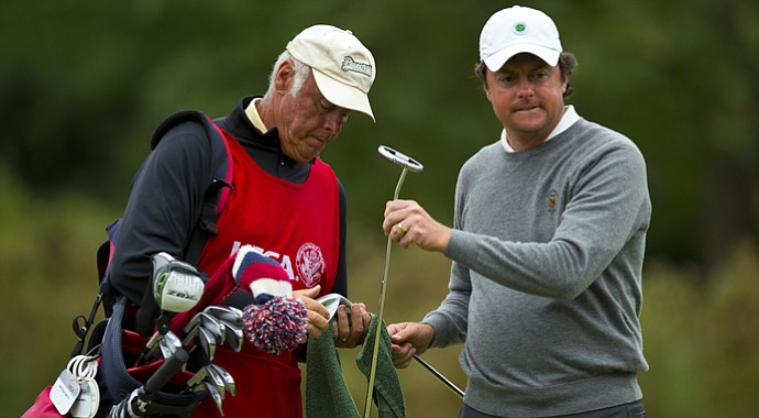 Nathan Smith (right) won his fourth U.S. Mid-Amateur on Sept. 13 with father and caddie Larry (left) by his side.