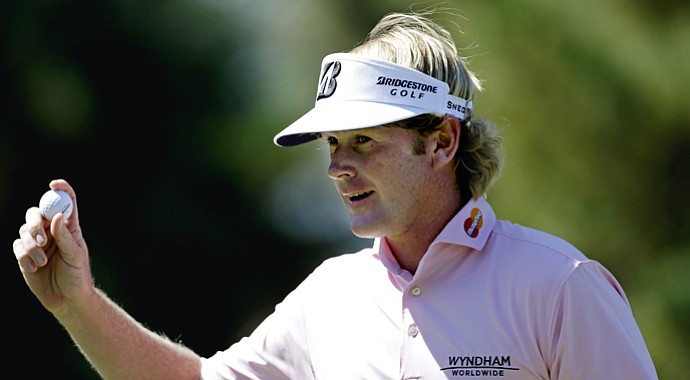 Brandt Snedeker acknowledges applause from the crowd after sinking a putt on the fourth hole during the final round of the Tour Championship Sunday, Sept. 23, 2012, in Atlanta.