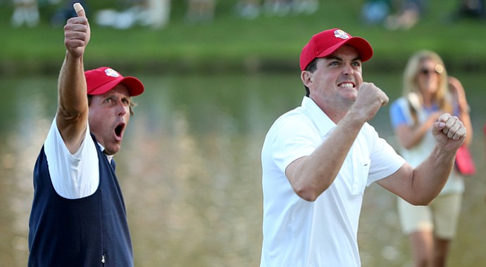 Phil Mickelson and Keegan Bradley of the USA celebrate on the 17th green after winning their Friday four-ball match during the 2012 Ryder Cup.
