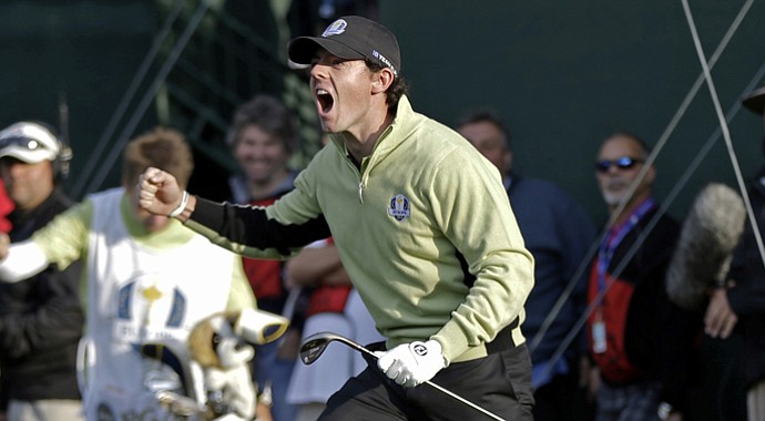 Europe's Rory McIlroy reacts after chipping in on the fourth hole during a foursomes match at the Ryder Cup Friday, Sept. 28, 2012, at the Medinah Country Club in Medinah, Ill.