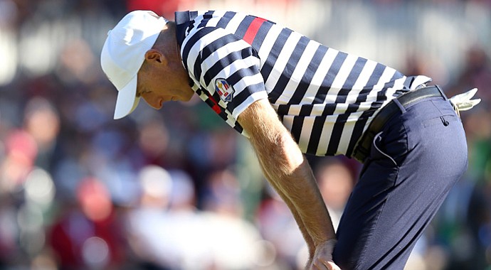 Jim Furyk of the USA reacts to a missed par putt on the 18th green that cost him a 1-down loss to Sergio Garcia.