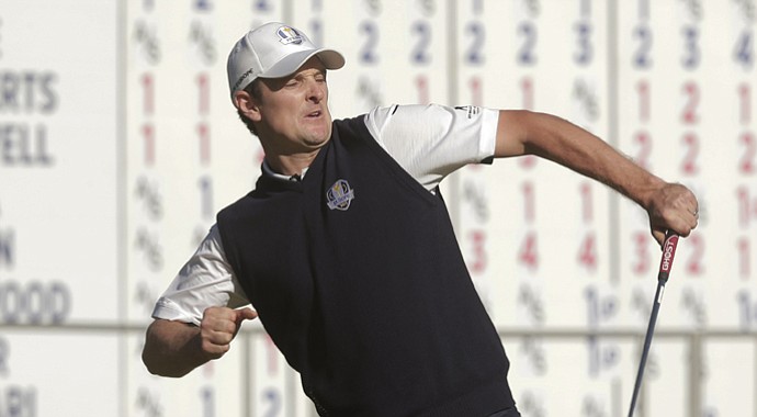 Europe's Justin Rose reacts after defeating USA's Phil Mickelson on the 18th hole during a singles match at the Ryder Cup PGA golf tournament Sunday, Sept. 30, 2012, at the Medinah Country Club in Medinah, Ill.