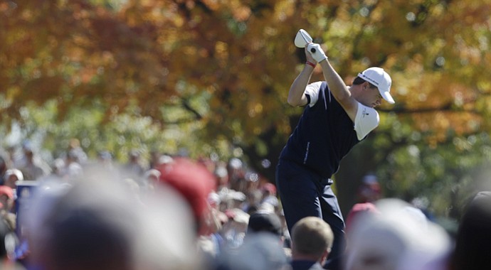 Europe's Paul Lawrie hits a drive on the ninth hole during a singles match at the Ryder Cup PGA golf tournament Sunday, Sept. 30, 2012, at the Medinah Country Club in Medinah, Ill.