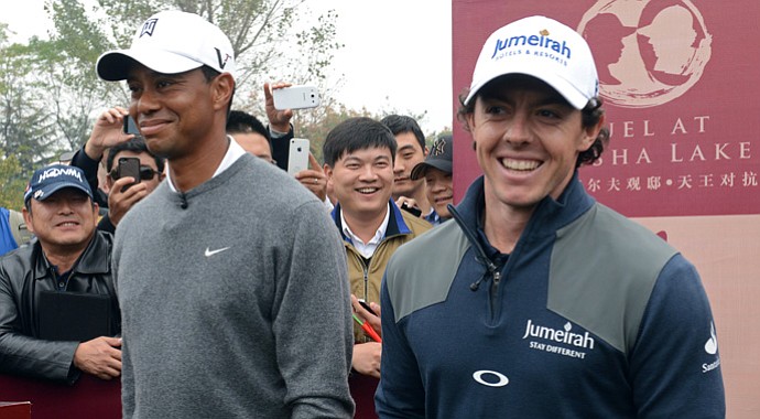 World No. 1 Rory McIlroy and Tiger Woods pose before teeing off at the 'Duel at Jinsha Lake.'