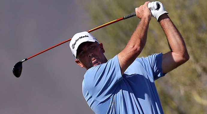 Tom Lehman hits a tee shot on the fifth hole during the final round of the Charles Schwab Cup Championship.