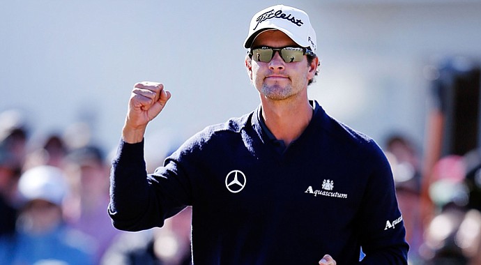 Adam Scott celebrates his win on the 18th hole during Day 4 of the Australia Masters.