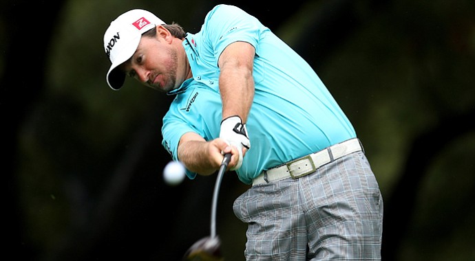 Graeme McDowell hits his tee shot on the sixth hole during the second round of the Tiger Woods World Challenge.