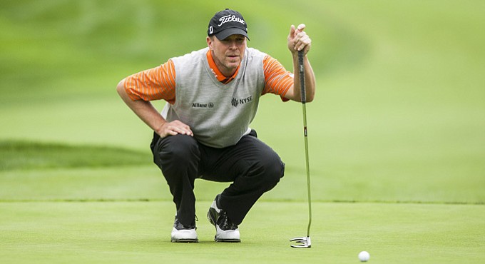 Steve Stricker reads a putt during the World Challenge.