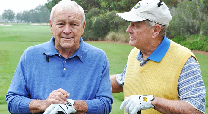 Arnold Palmer and Jack Nicklaus chat at the back of the 1st tee box during the first round of the Father/Son Challenge at the Ritz-Carlton Golf Club in Orlando.