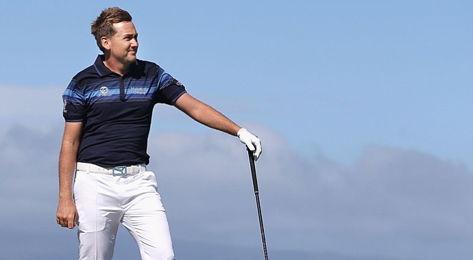 Ian Poulter watches his tee shot on the 10th hole during the replay of the first round of the Hyundai Tournament of Champions.