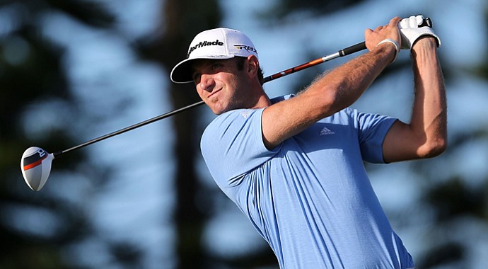 Dustin Johnson hits a tee shot on third hole during the final round of the Hyundai Tournament of Champions at the Plantation Course.