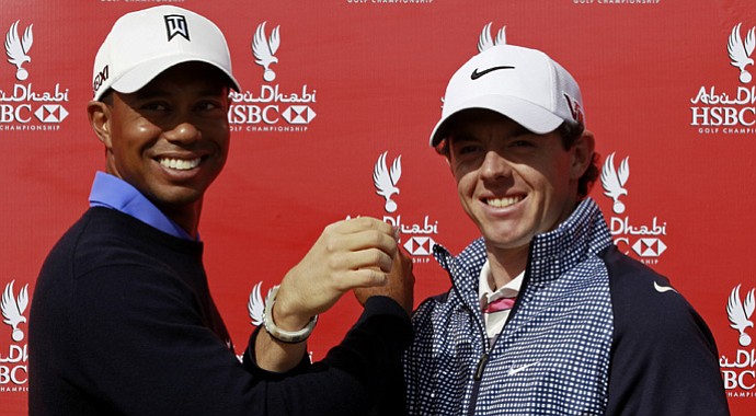 World No. 1 Rory McIlroy (right) and Tiger Woods make a toast during a photoshoot ahead of the 20th Abu Dhabi Golf Championship.