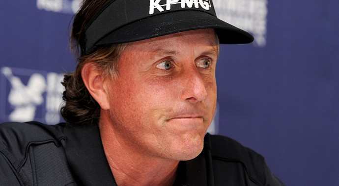 Phil Mickelson reacts to questions during his media interview after his pro-am round for the Farmers Insurance Open.