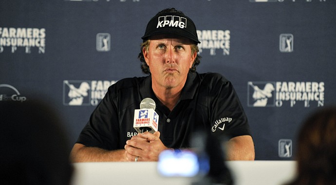 Phil Mickelson reacts to questions during his media interview after his pro-am round for the Farmers Insurance Open.