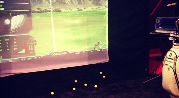 OptiShot, the simulator, comes in the size of a shoe box.