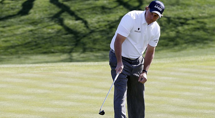 Phil Mickelson follows a putt during Round 3 of the Waste Management Phoenix Open.