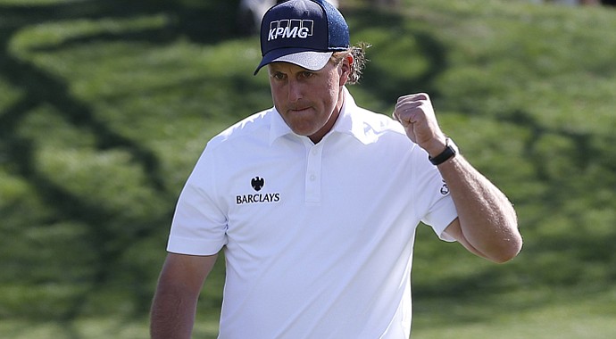 Phil Mickelson pumps his fist during Round 3 of the Waste Management Phoenix Open.