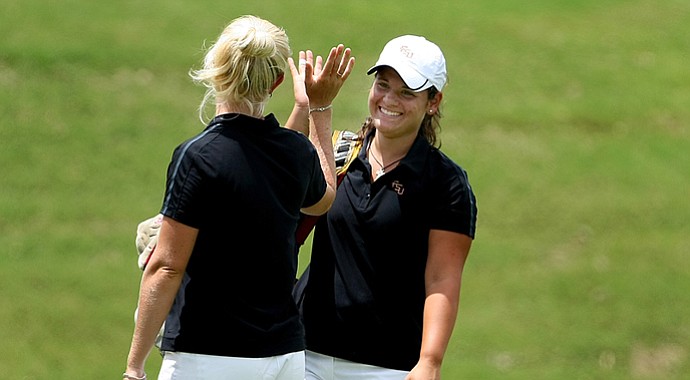 Florida State's Jessica Negron gets a high-five during the 2011 NCAA East Regional.