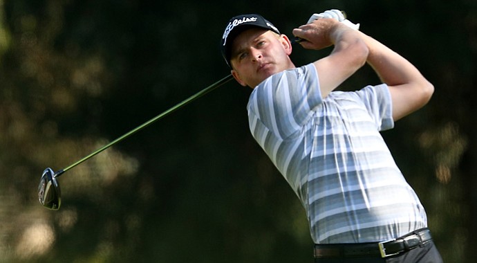 John Merrick hits his tee shot on the second hole during the final round of the Northern Trust Open.