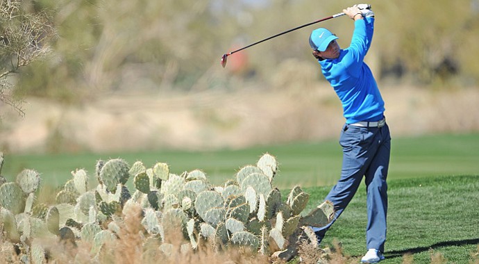 Rory McIlroy plays a shot during practice prior to the start of the WGC-Accenture Match Play Championship.