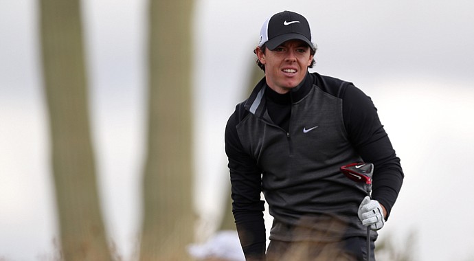 Rory McIlroy watches his tee shot on the second hole during the first round of the World Golf Championships-Accenture Match Play at the Golf Club at Dove Mountain on February 21, 2013 in Marana, Ariz.
