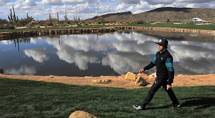 Rickie Fowler is headed home after a 19-hole loss to Carl Pettersson in the first round.