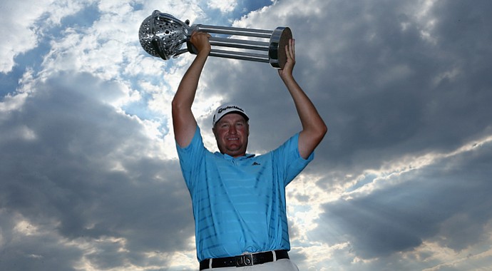 Dawie Van Der Walt poses with the trophy after winning the Tshwane Open at Copperleaf Golf & Country Estate.