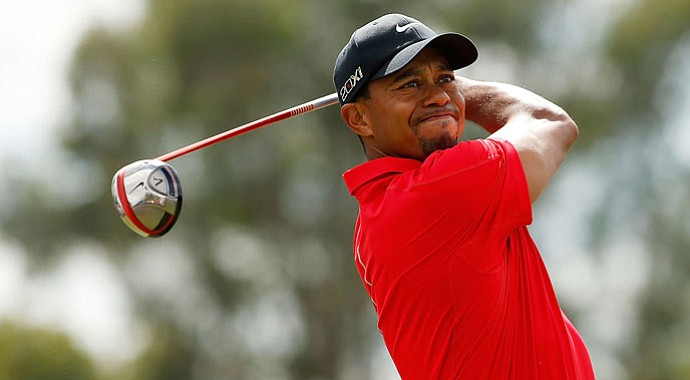 Tiger Woods hits his tee shot on the third hole during the final round of the WGC-Cadillac Championship.