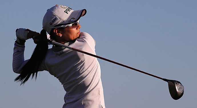 Ai Miyazato hits a tee shot on the 18th hole during the first round of the RR Donnelley LPGA Founders Cup.
