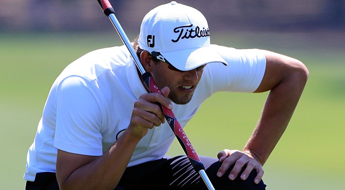 Adam Scott fired a bogey-free, 5-under 66 to move into contention at the Tampa Bay Championship.